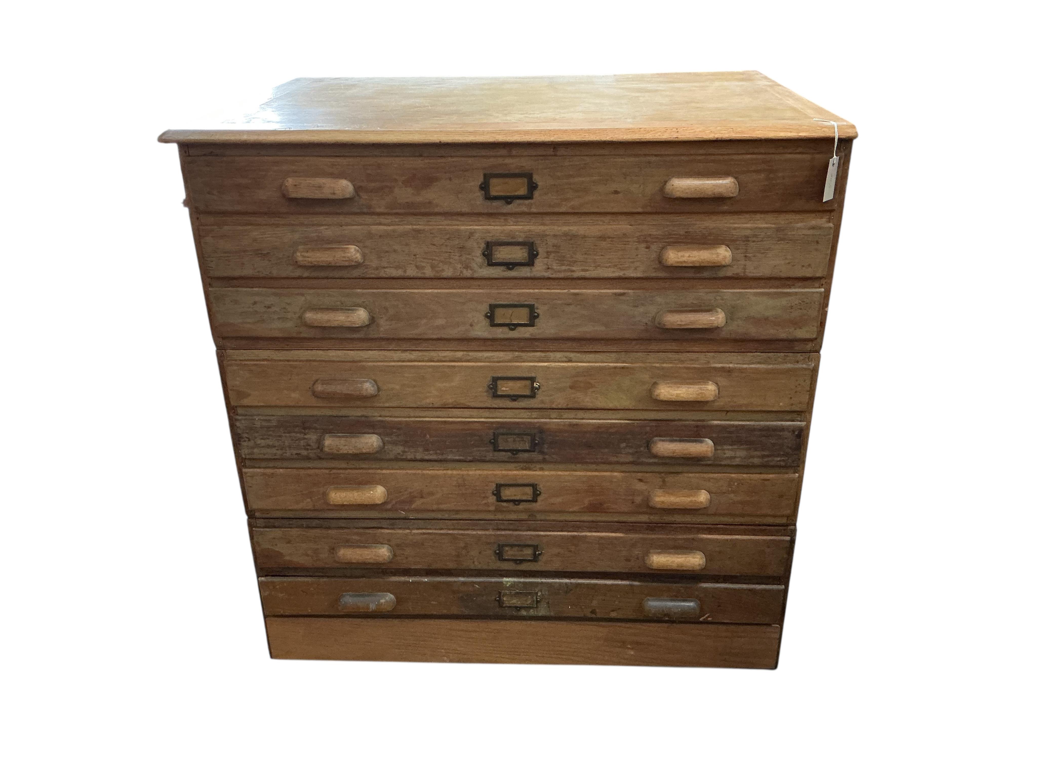 A mid century oak three section plan chest, width 117cm, depth 84cm, height 120cm